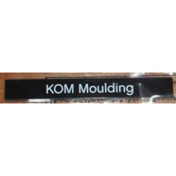 Tile 1 x 8 with 'KOM Moulding' Pattern: {черен}