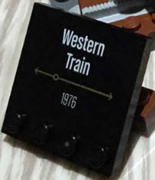 Tile, Modified 4 x 4 with Studs on Edge with 'Western Train 1976' Pattern: {черен}