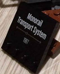 Tile, Modified 4 x 4 with Studs on Edge with 'Monorail Transport System 1987' Pattern: {черен}