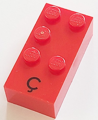 Brick, Braille 2 x 4 with 5 Studs with Black Capital Letter C with Cedilla (Ç) Pattern (dots-12346 ⠯) (French with Antoine Numbers): {ярко червен}